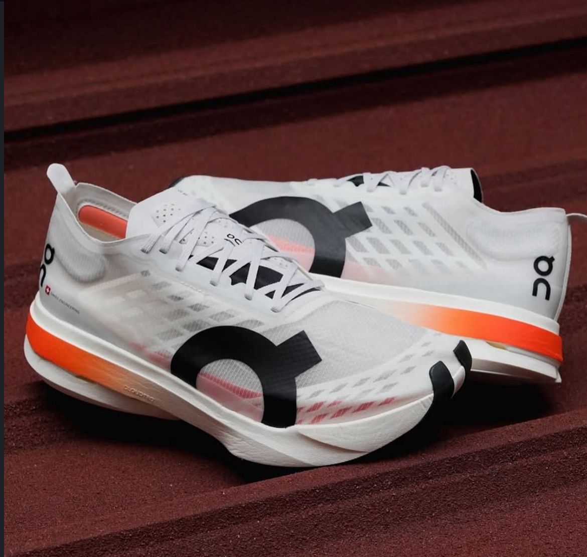 On Cloudboom Strike White Orange