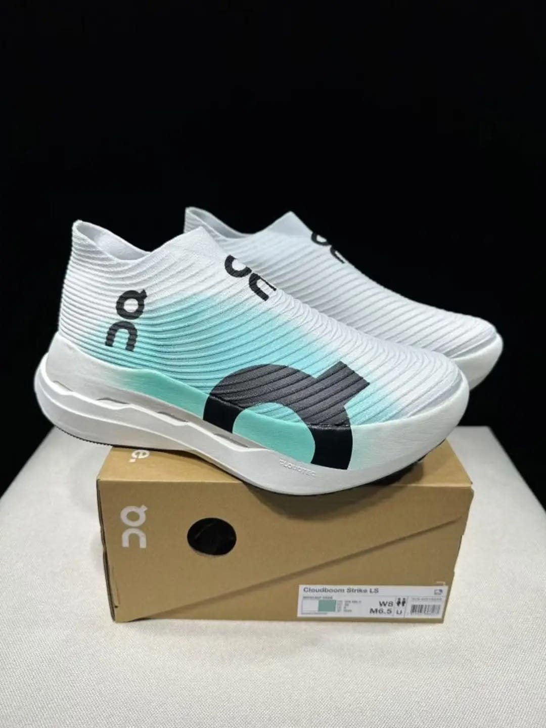 On Cloudboom Strike LS White and Mint Green